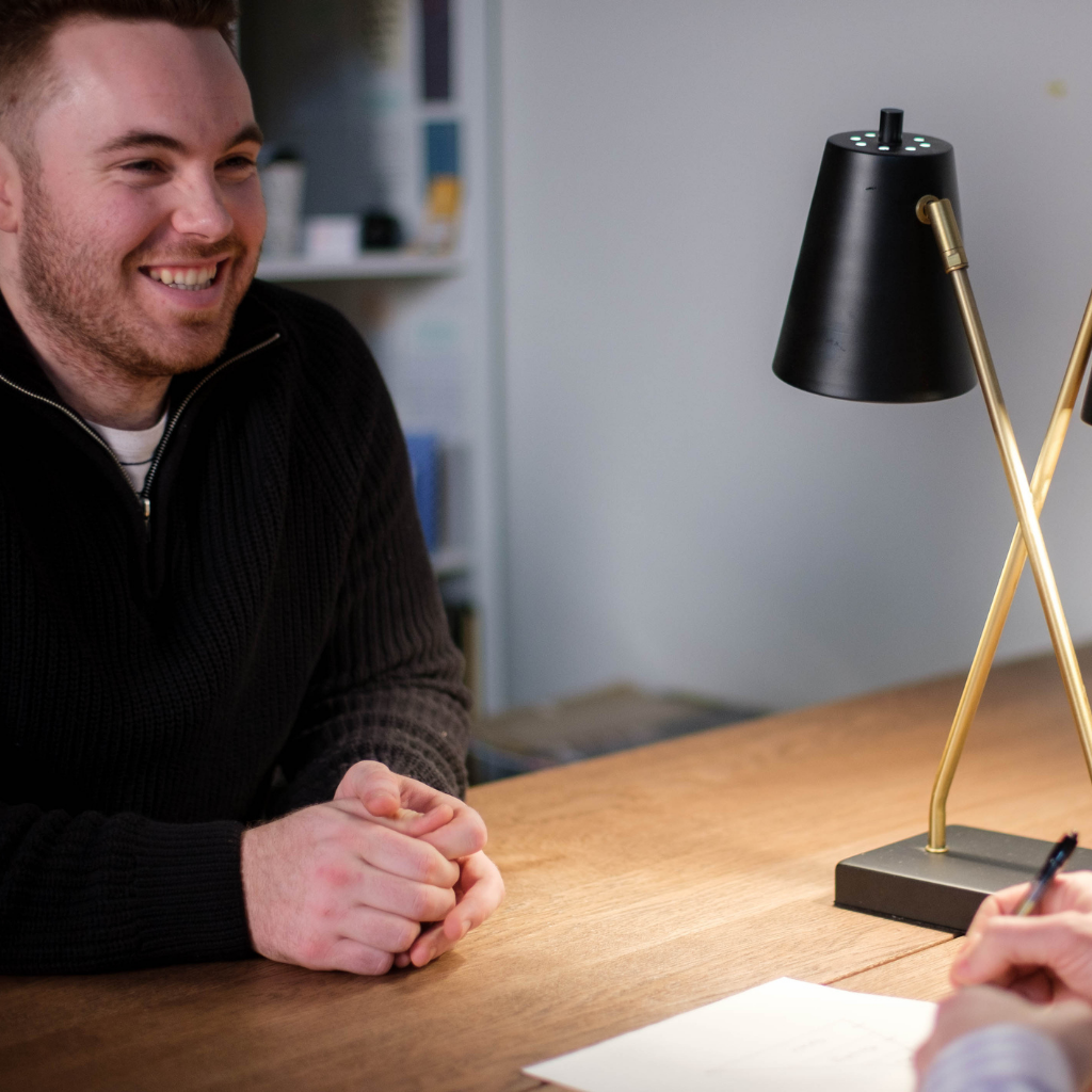 man talking to student